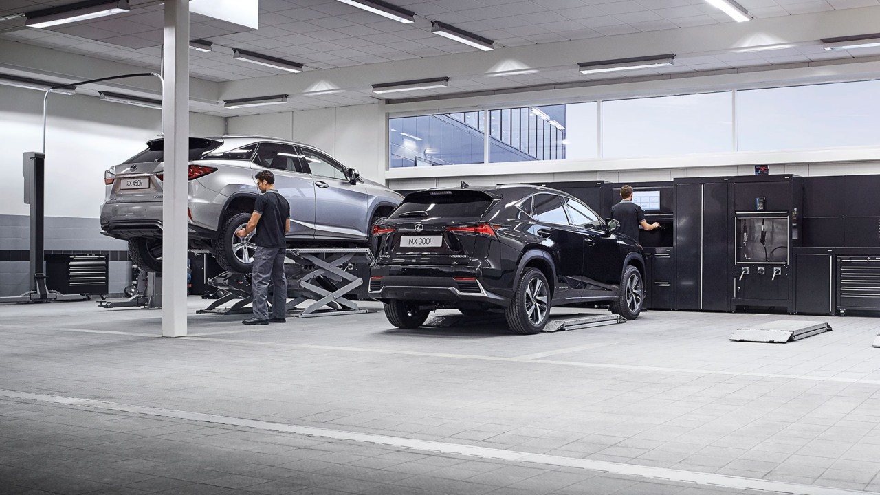 A Lexus RX 450h and NX 300h in a garage
